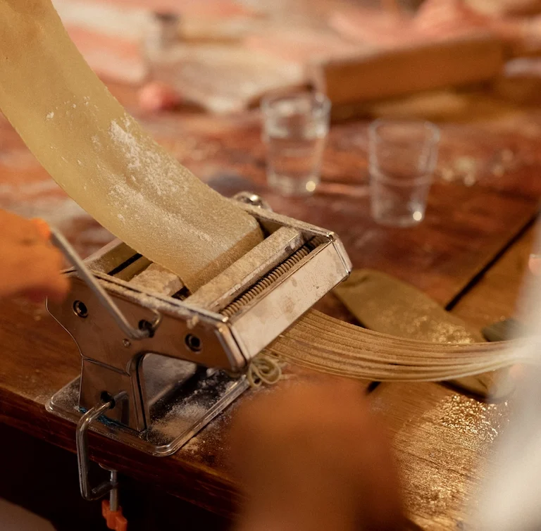 Master the techniques of making fresh pasta from scratch, including various shapes and styles.
