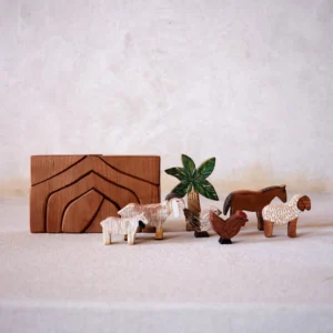 Discover Sheryl's Handmade Wooden Toy Farm, crafted in Qatar. Sustainable, hand-painted, and finished with natural beeswax. Perfect for imaginative play.A