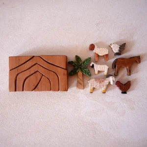 Discover Sheryl's Handmade Wooden Toy Farm, crafted in Qatar. Sustainable, hand-painted, and finished with natural beeswax. Perfect for imaginative play.A