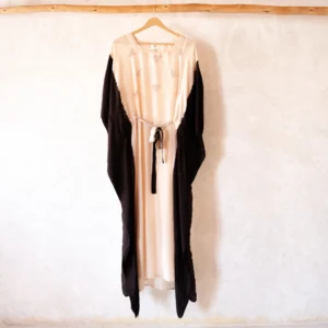 Shop the Izmir Black Silk Kaftan by Sonali Raman, featuring luxurious 100% silk and traditional Bandhej craftsmanship. Handcrafted elegance and mindful fashion.
