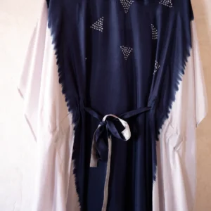 Shop the Izmir Indigo Silk Kaftan by Sonali Raman, featuring luxurious 100% silk and traditional Bandhej craftsmanship. Handcrafted elegance and mindful fashion.