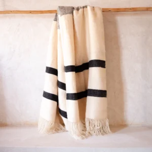 Shop our beautiful, thick, and warm Sheep Wool Handwoven Blanket from Morocco. Perfect as a sofa throw or bed cover.