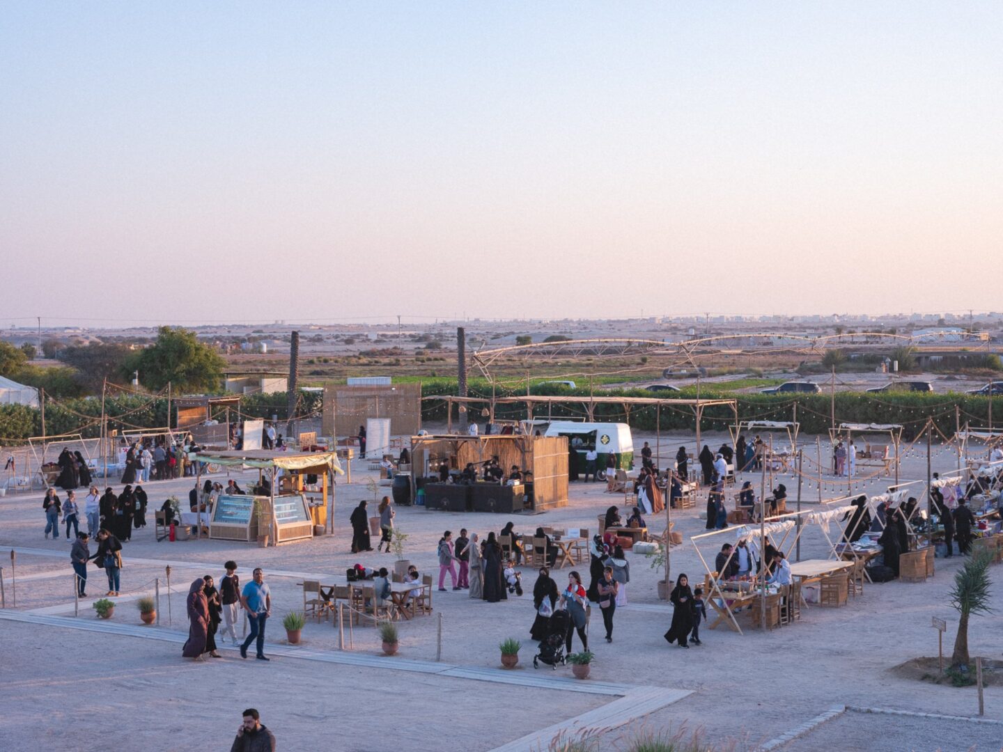 A wide view of the Winter Bazaar at dusk