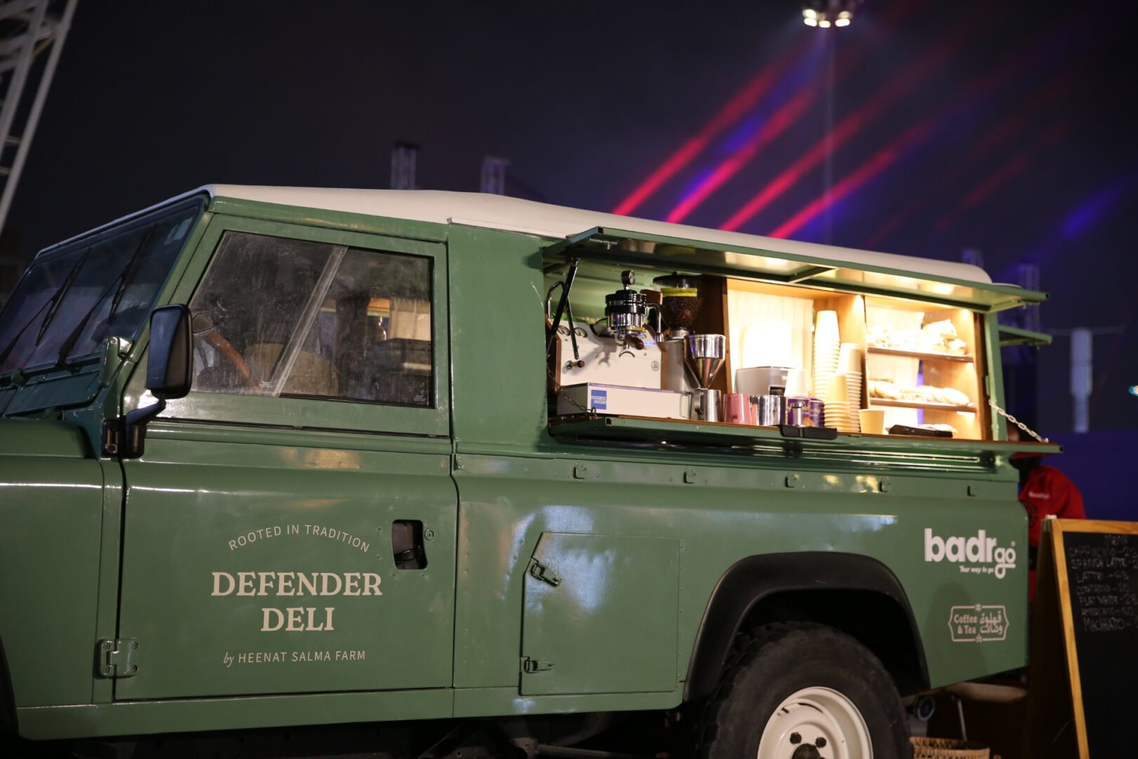 The green Defender Deli vehicle with its serving hatch open